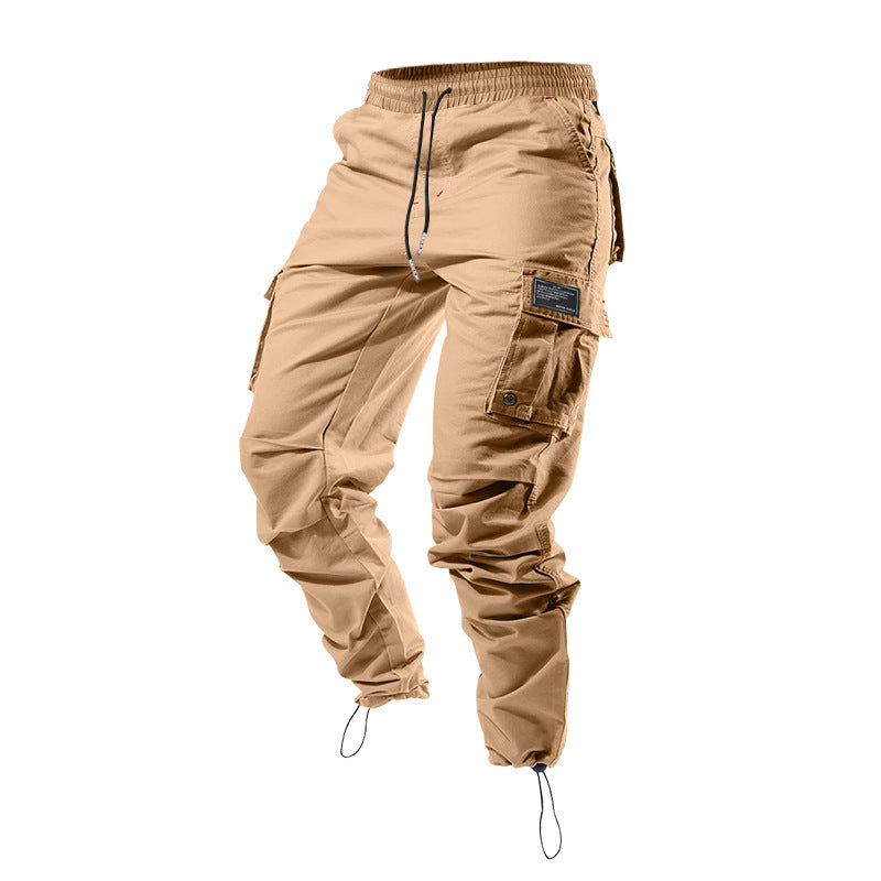Pantalones cargo holgados de hombre en color liso con múltiples bolsillos y puños con cordón, marca AriasCreative.