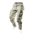 Pantalones cargo holgados para hombre de AriasCreative en color liso con múltiples bolsillos y puños con cordón.